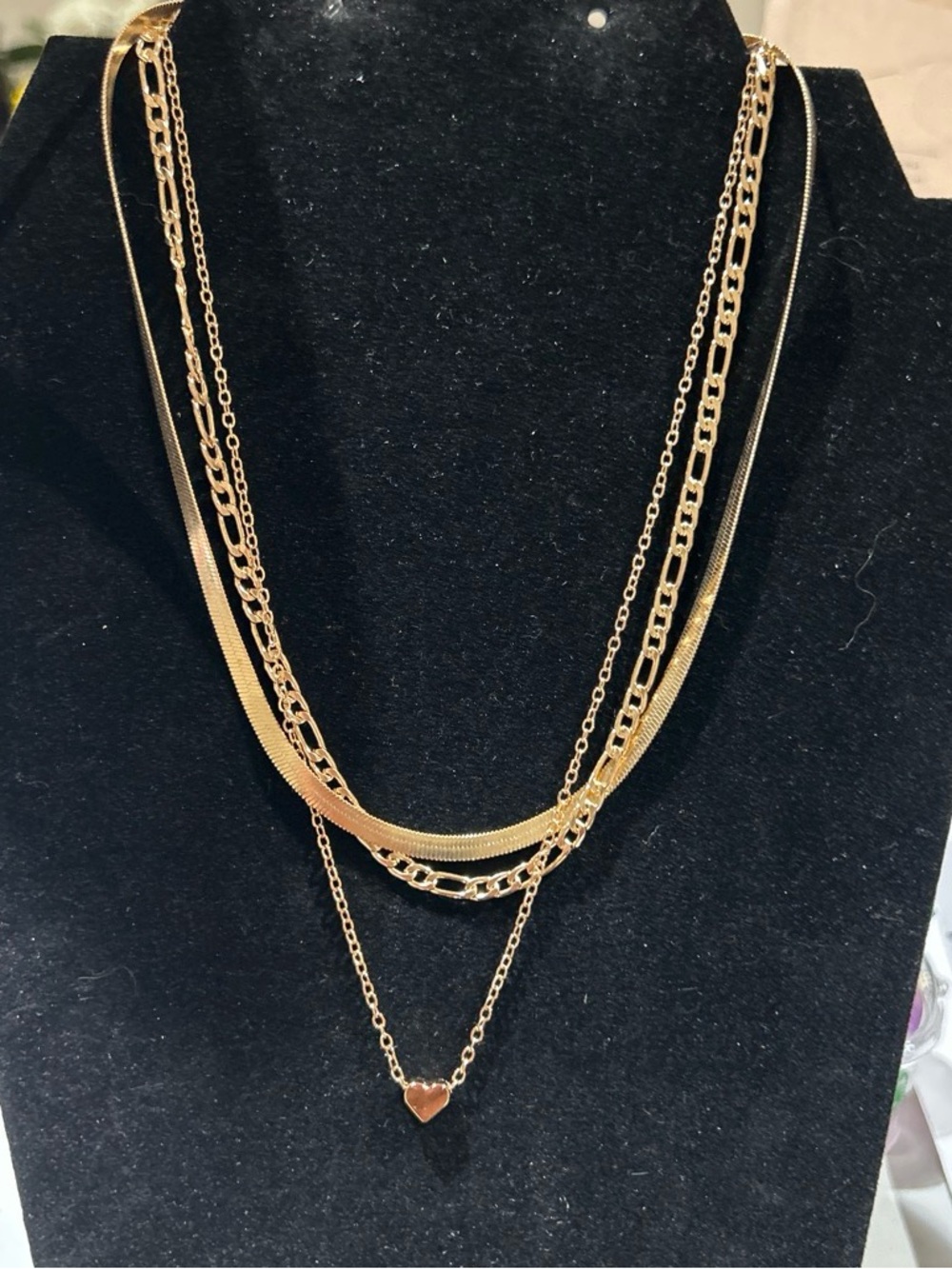 Gold color triple layer necklace with heart pendant